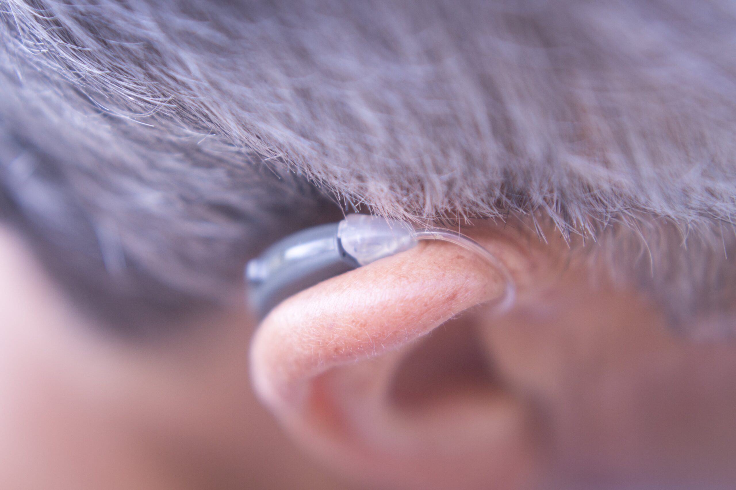 Man wearing hearing aids.